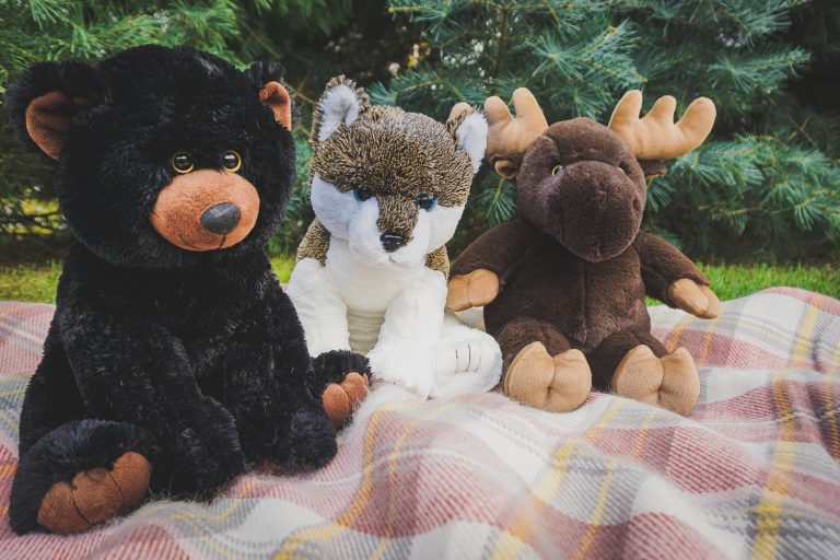 Close-up of Brown Moose plush toy showcasing embroidered details and ultra-soft fabric.
